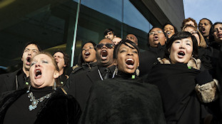The Nathaniel Dett Chorale performs on the steps of the Canadian Embassy  overlooking the beginning of U.S.President Barack Obama's Inaugural parade. photo: © johnbeebe 